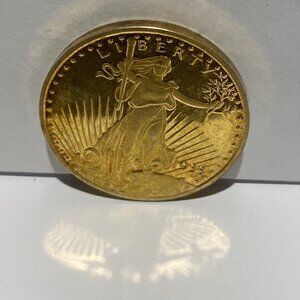 COPY OF A 1933 $20 GOLD PLATED COIN